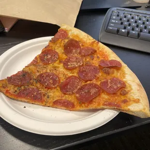 Slice of pepperoni pizza