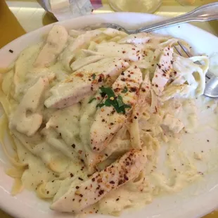 Chicken fettuccine Alfredo. I added Parmesan cheese and crushed pepper as I ate.