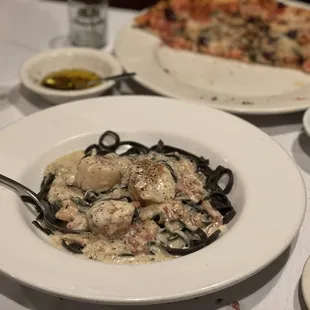 Squid ink pasta with scallops