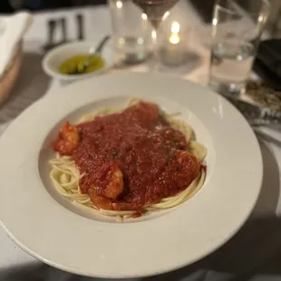 This is an off menu dish, so you gotta know what to ask for...prawns in a spicy red sauce over a bed of pasta.