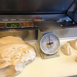 We make our pizza dough in house daily!