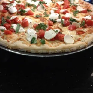 Mozzarella Caprese pizza.
