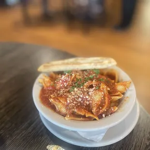 Side of pasta with meat sauce