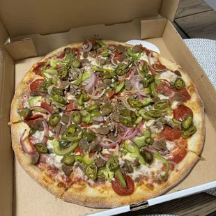 Supreme Pizza - 14" no olives, but added on jalapeños