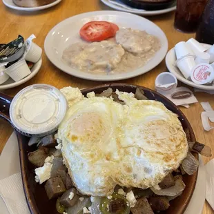 Kevin Ls Special skillet, Two Biscuits with Gravy, and The Athenian skillet