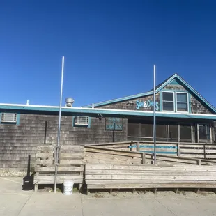 Outside of the restaurant.  Obviously a no frills, good company and delicious food local joint.  A must on your list