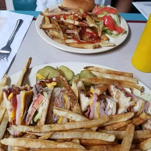 Club plate and a cheeseburger with home cooked fresh fries