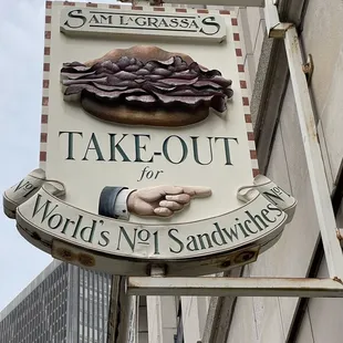 The Exterior of Sam LaGrassa&apos;s Restaurant in Boston with the Sandwich &amp; Take-Out Sign.