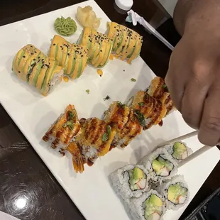 Left to right; texas roll, super crunchy roll, California roll