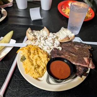 Pork ribs plate with broccoli n cheese and macaroni salad for sides.