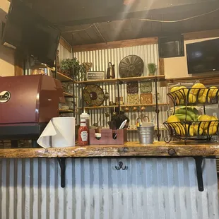 a counter with a variety of items on it