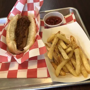 a basket of fries and a hot dog