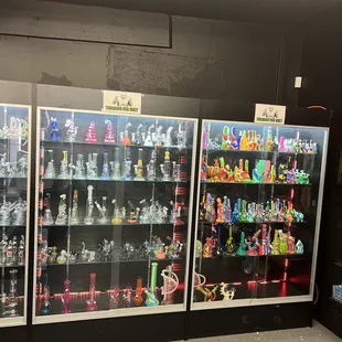 a display of glass smoking pipes
