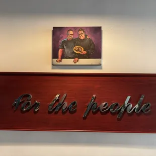  a sign that says, be the people