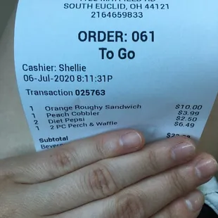 a person holding a receipt