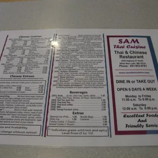 Menu - Thai on one side, Chinese on the other side.