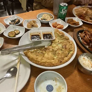 Banchon, seafood panja, spicy chicken and seafood noodles with veggies.