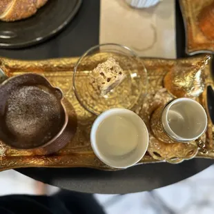 Turkish coffee (double) with a side of milk, a hazelnut delight, and Simit (Turkish Bagel)