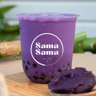 a purple smoothie with blueberries