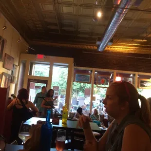 a woman eating at a table