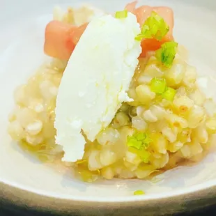 a plate of food with rice and vegetables