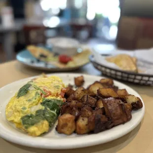 Veggie omelette with home potatoes