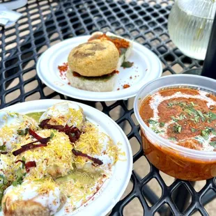 three plates of food on a table