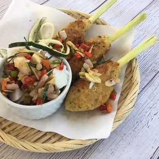 Chicken satay, not bamboo skewered but wrap around lemongrass, original. It's been all over Bali for centuries.