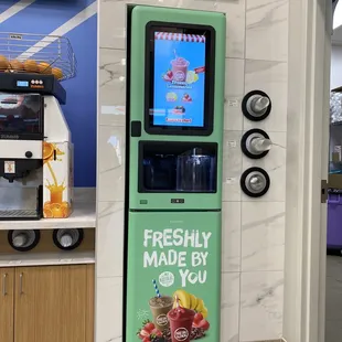 a green vending machine