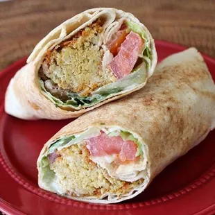 two burritos on a red plate