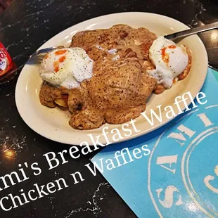 a plate of waffles and eggs