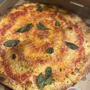 Wood fired classic pizza with a side of hot honey!