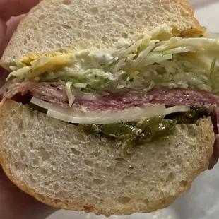 TRE: SALAMI, MORTADELLA, AND PROSCIUTTO ON BAGUETTE WITH PROVOLONE, LETTUCE TOSSED IN RED WINE VINAIGRETTE, (NO) ONION. MAYO, &amp; MUSTARD