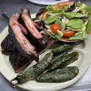 Smoked pork ribs, grilled jalapeños, house salad.