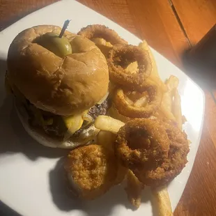 Sammie&apos;s Burger with fries and onion rings