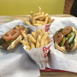 Two hot dogs: jumbo (left) and chicago style (right) with 2 orders of medium fries.  Not bad.