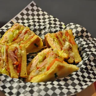 a sandwich in a basket on a table