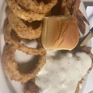 The chicken fried steak was delicious  I paired it with sweet potato fries and onion rings  !