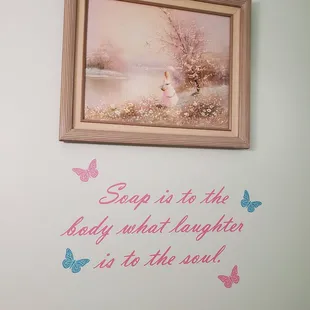 a painting of a woman and butterflies