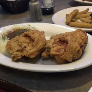 Broasted 2 piece meal with mashed potatoes and gravy