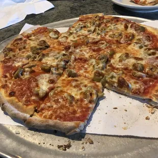 Canadian bacon and green olive