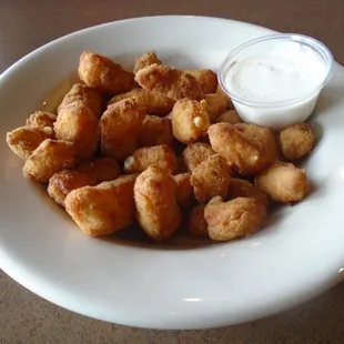 Jalapeno cheese curds with dipping sauce.