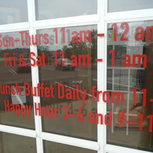 Hours of operation, front entry door.