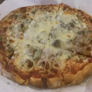 This is a pizza. Some assembly required... likes to fall apart at the seams...