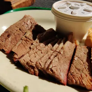 Brisket, sliced. Bbq sauce on the side
