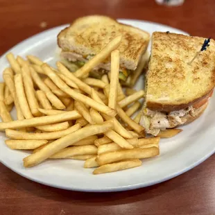 a grilled chicken sandwich and french fries