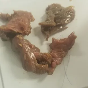 a piece of meat on a tray