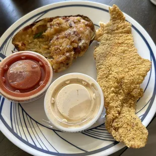 Small thin fried catfish with stuffed potato ($2 up charge). One piece of fish only