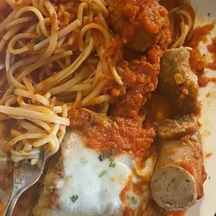 Eggplant parm with sghetti and side of italian sausage