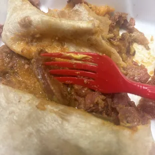 This burrito has a small amount of pastrami